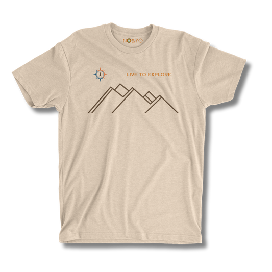 NO&YO natural tan graphic tee with minimalist mountain line art and compass reading “Live to Explore.”