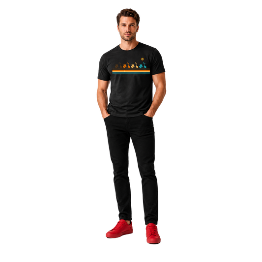 Tall male model wearing the NO&YO Vintage Scooter graphic t-shirt, black pants, and red sneakers in a clean studio setting, showcasing a retro travel-inspired design.