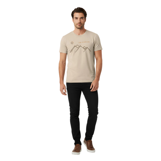 Man wearing a beige t-shirt with a mountain design on a white background