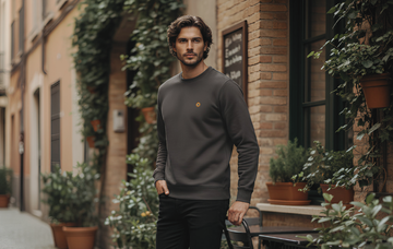 NO&YO City Movement - Model with NO&YO sweater in black walking in the city
