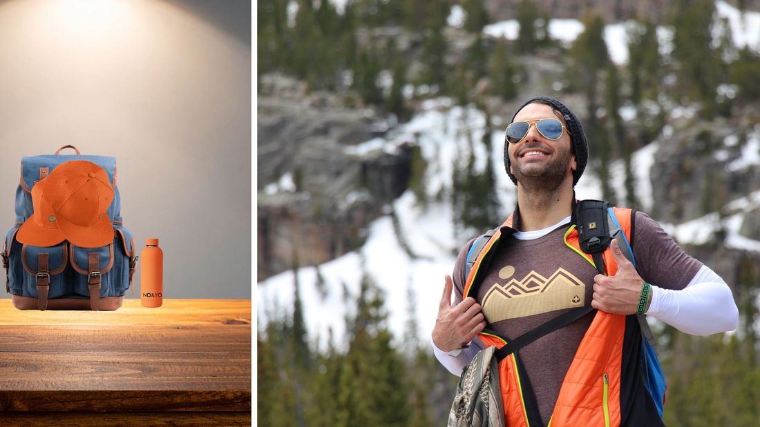 Smiling traveler wearing NO&YO apparel and backpack enjoying a mountain adventure, representing a weekend road trip packing guide