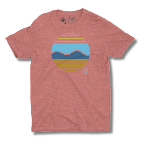 Red t-shirt with a colorful sun and waves graphic design on a red background