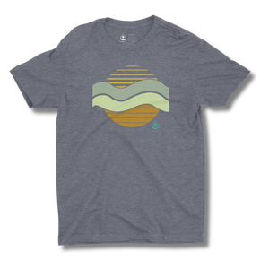 Gray t-shirt with a colorful sun and waves graphic design on a gray background
