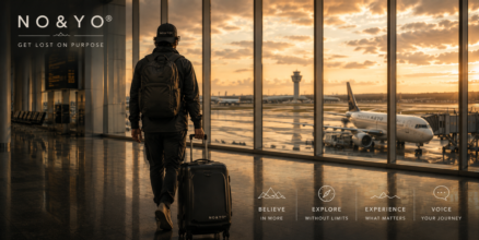 Cinematic NO&YO® airport travel banner featuring a modern explorer walking through a luxury airport terminal with luggage, large windows overlooking airplanes at sunset, and the brand pillars Believe, Explore, Experience, and Voice alongside the phrase Get Lost On Purpose.