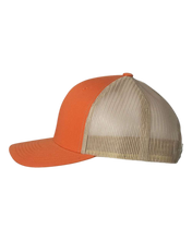 Load image into Gallery viewer, Side view of NO&amp;YO orange trucker hat featuring rustic orange front panels, breathable beige mesh back, and structured snapback design.
