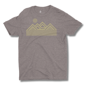 Brown t-shirt with a mountain graphic on a brown background