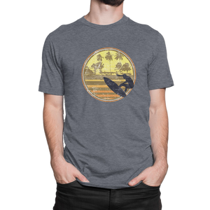 Ride the wave in style with the NO&YO Vintage Surfer Adventure Tee in heather navy. Featuring a retro palm tree and surf design, this premium shirt is built for explorers who love the ocean."