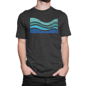 Ride the flow with the NO&YO Wave Graphic Tee – available in gray and black. Featuring a vintage surf-inspired design with ocean wave lines, this premium t-shirt is crafted for explorers who live for freedom and adventure.
