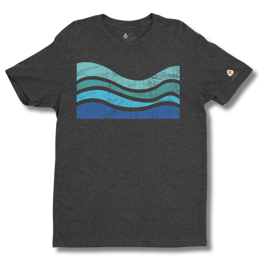 Gray t-shirt with blue and green wavy design on a white background