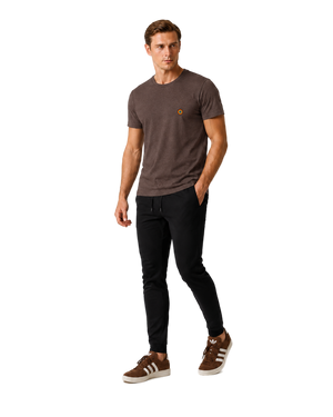 NO&YO men’s Dark Roast premium t-shirt with embroidered sunset badge logo, angled studio lifestyle model view.