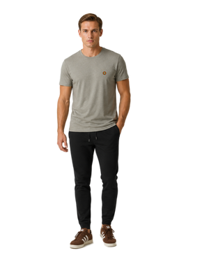 NO&YO men’s Heather Stone premium t-shirt featuring embroidered sunset badge logo, front-facing studio model.