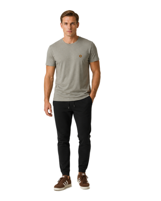 NO&YO men’s Heather Stone premium t-shirt featuring embroidered sunset badge logo, front-facing studio model.