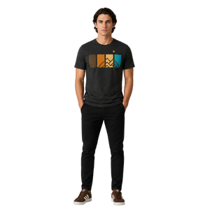 Men’s Ridgeline Tee premium black mountain graphic t-shirt featuring retro color panel mountain design worn by male model in studio.